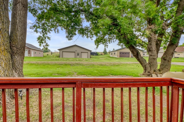 24505 Twilight Ln, Lida Twp, MN 56572 - view of green lawn with an outdoor structure and a detached garage