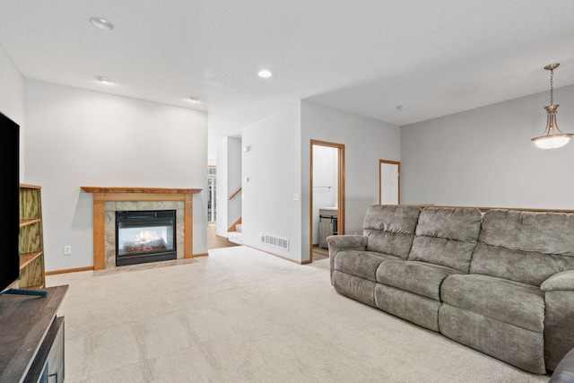 4107 Regent Ave N, Robbinsdale, MN 55422 - carpeted living area with a fireplace and recessed lighting
