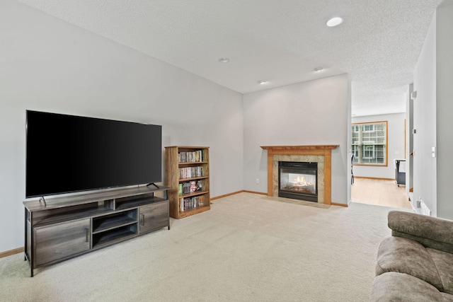 4107 Regent Ave N, Robbinsdale, MN 55422 - living room with carpet flooring, a high end fireplace, a textured ceiling, baseboards, and recessed lighting
