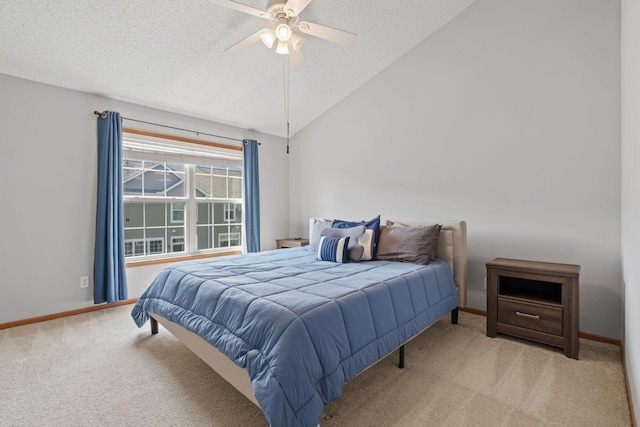4107 Regent Ave N, Robbinsdale, MN 55422 - bedroom featuring carpet floors, a textured ceiling, baseboards, lofted ceiling, and a ceiling fan