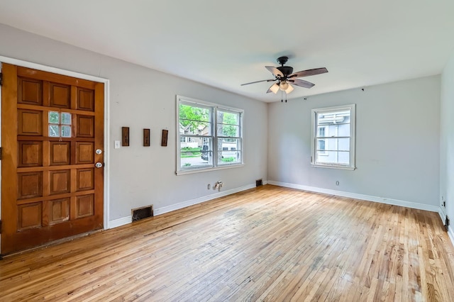 583 Cromwell Ave, Saint Paul, MN 55104 - entrance foyer featuring ceiling fan, light wood-type flooring, and baseboards