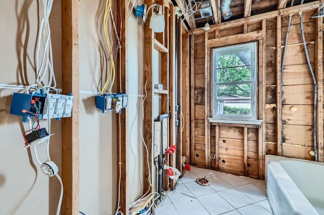 583 Cromwell Ave, Saint Paul, MN 55104 - full bath with a bath and tile patterned flooring