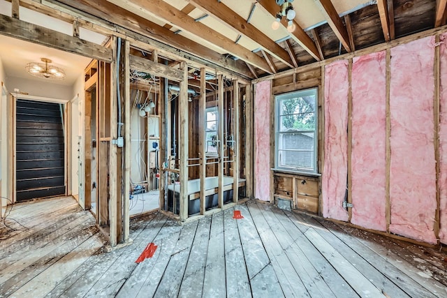 583 Cromwell Ave, Saint Paul, MN 55104 - miscellaneous room featuring hardwood / wood-style floors and a chandelier