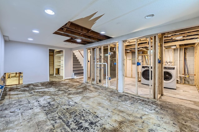 583 Cromwell Ave, Saint Paul, MN 55104 - basement featuring washer / dryer, stairway, and recessed lighting