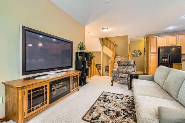 3661 Hazel Trl Unit H, Woodbury, MN 55129 - carpeted living room with stairs and a textured ceiling