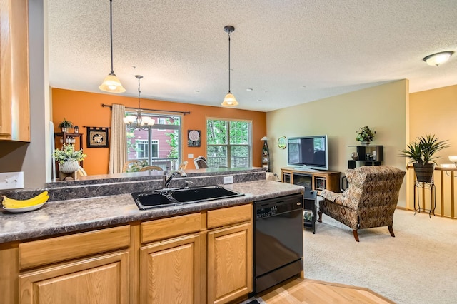 3661 Hazel Trl Unit H, Woodbury, MN 55129 - kitchen with black dishwasher, a sink, a textured ceiling, dark countertops, and decorative light fixtures