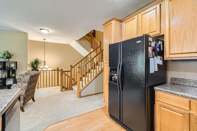 3661 Hazel Trl Unit H, Woodbury, MN 55129 - kitchen with black refrigerator with ice dispenser, a textured ceiling, light wood finished floors, a chandelier, and white dishwasher