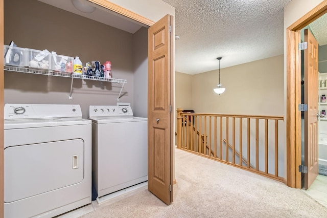 3661 Hazel Trl Unit H, Woodbury, MN 55129 - laundry room featuring separate washer and dryer and light carpet