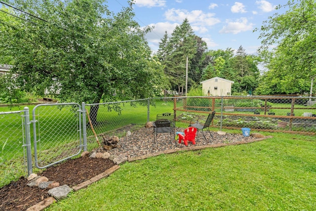 9301 Northwood Pkwy, New Hope, MN 55427 - view of yard with a gate and a shed