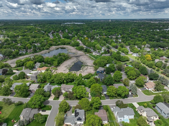 8821 Jonquil Ln N, Maple Grove, MN 55369 - aerial perspective of suburban area featuring a nearby body of water