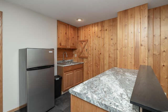8821 Jonquil Ln N, Maple Grove, MN 55369 - kitchen featuring freestanding refrigerator, a sink, light countertops, dark tile patterned floors, and recessed lighting