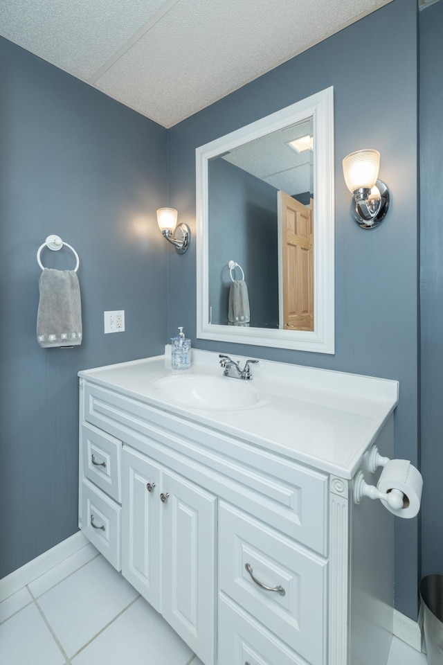 8821 Jonquil Ln N, Maple Grove, MN 55369 - bathroom featuring vanity, baseboards, and tile patterned floors