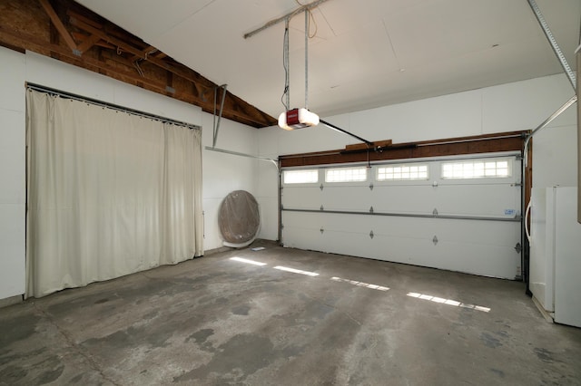 8821 Jonquil Ln N, Maple Grove, MN 55369 - garage featuring a garage door opener