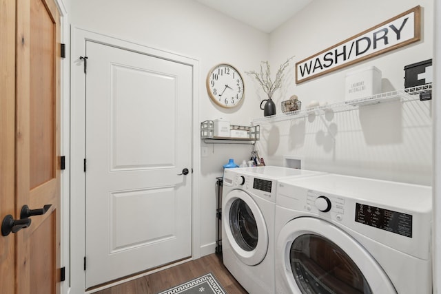 25822 Emerson Ct, Wyoming, MN 55092 - laundry area featuring washer and dryer and dark wood-type flooring
