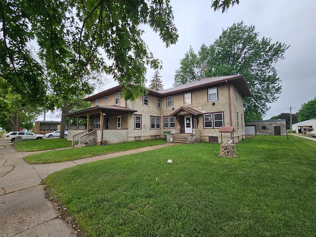 421 Broadway St, Ellsworth, MN 56129 - view of front of house with a front lawn