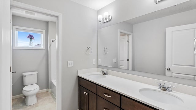 6455 Timber Arch Dr, Chaska, MN 55318 - full bathroom featuring double vanity, toilet, shower / bath combination with curtain, baseboards, and tile patterned floors