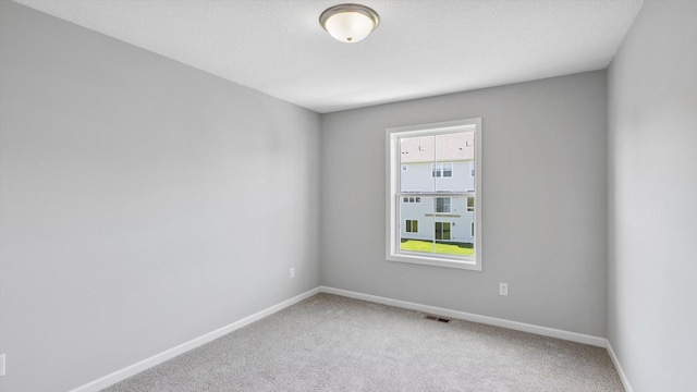 6455 Timber Arch Dr, Chaska, MN 55318 - carpeted empty room featuring baseboards