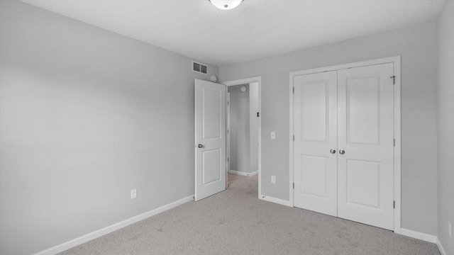 6455 Timber Arch Dr, Chaska, MN 55318 - unfurnished bedroom featuring carpet, baseboards, and a closet
