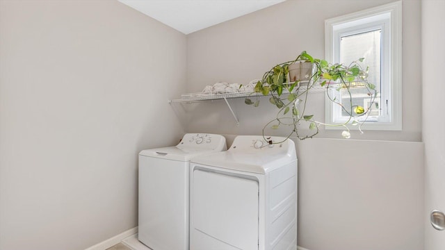 6455 Timber Arch Dr, Chaska, MN 55318 - laundry area with washer and dryer and baseboards