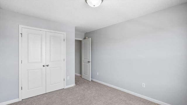 6455 Timber Arch Dr, Chaska, MN 55318 - unfurnished bedroom with a closet, carpet, and baseboards
