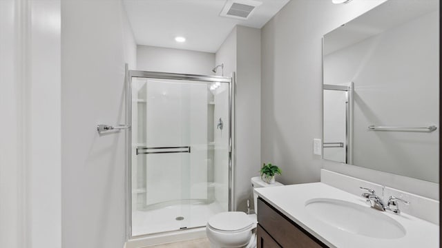 6455 Timber Arch Dr, Chaska, MN 55318 - bathroom featuring a stall shower, toilet, and vanity