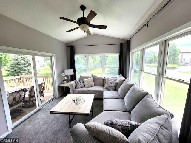 10402 Indiana Ave N, Brooklyn Park, MN 55443 - carpeted living area featuring vaulted ceiling, ceiling fan, and healthy amount of natural light