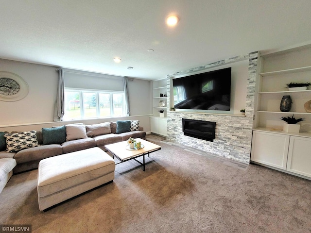 10402 Indiana Ave N, Brooklyn Park, MN 55443 - living room featuring built in shelves, a stone fireplace, carpet, and recessed lighting