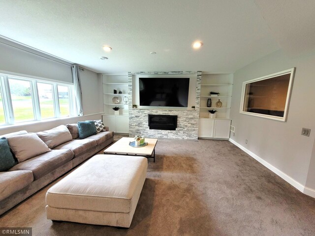 10402 Indiana Ave N, Brooklyn Park, MN 55443 - living area with baseboards, carpet floors, built in shelves, a fireplace, and recessed lighting