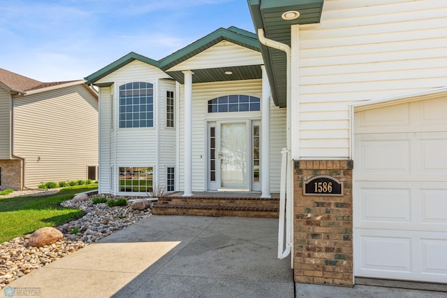 1586 Baywood Dr, Fargo, ND 58078 - property entrance featuring a garage