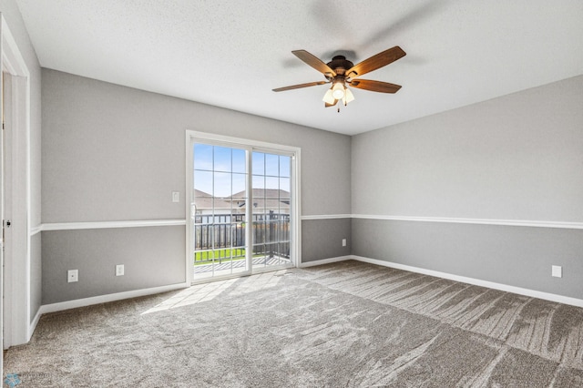 1586 Baywood Dr, Fargo, ND 58078 - unfurnished room featuring carpet floors, a ceiling fan, and baseboards