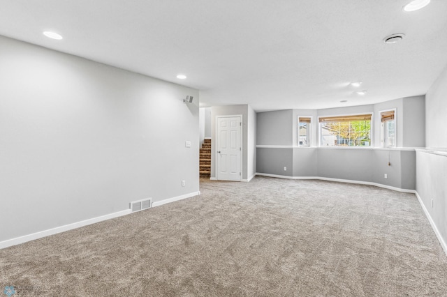 1586 Baywood Dr, Fargo, ND 58078 - spare room with carpet, stairs, recessed lighting, and baseboards