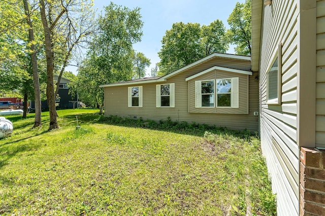 45379 Crystal Hills Dr, Lida Twp, MN 56572 - view of side of property featuring a yard