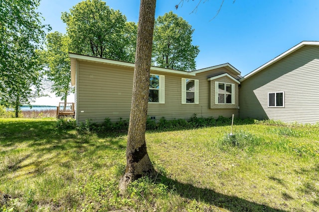 45379 Crystal Hills Dr, Lida Twp, MN 56572 - view of home's exterior with a lawn