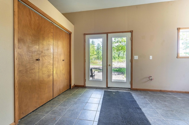 45379 Crystal Hills Dr, Lida Twp, MN 56572 - entryway featuring tile patterned floors, french doors, and baseboards