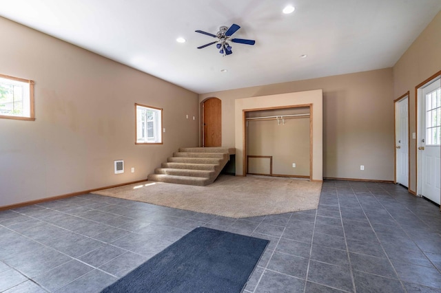 45379 Crystal Hills Dr, Lida Twp, MN 56572 - entrance foyer featuring healthy amount of natural light, dark tile patterned flooring, recessed lighting, and a ceiling fan