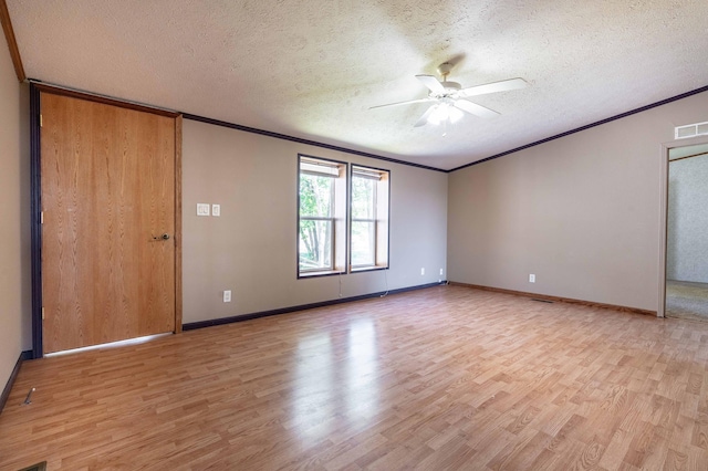 45379 Crystal Hills Dr, Lida Twp, MN 56572 - empty room featuring ornamental molding, light wood-style floors, a ceiling fan, a textured ceiling, and baseboards
