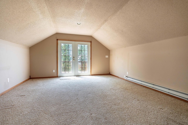 45379 Crystal Hills Dr, Lida Twp, MN 56572 - bonus room featuring a baseboard heating unit, a textured ceiling, lofted ceiling, carpet floors, and baseboards