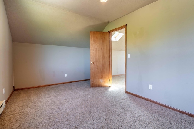 45379 Crystal Hills Dr, Lida Twp, MN 56572 - additional living space featuring lofted ceiling, carpet, baseboards, and a baseboard heating unit