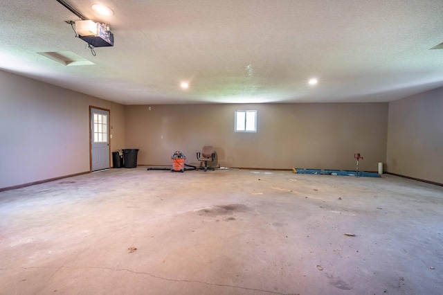 45379 Crystal Hills Dr, Lida Twp, MN 56572 - garage with baseboards, recessed lighting, and a garage door opener