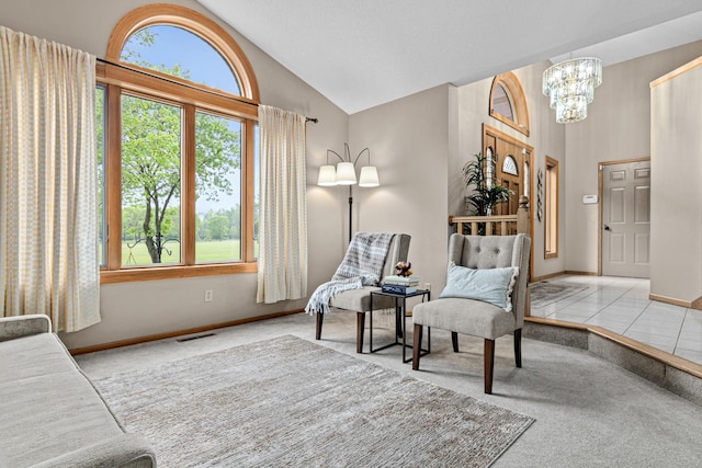 4985 142nd Ln NW, Ramsey, MN 55303 - living area with a chandelier, carpet floors, and high vaulted ceiling