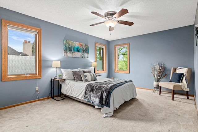 4985 142nd Ln NW, Ramsey, MN 55303 - carpeted bedroom with a textured ceiling and a ceiling fan