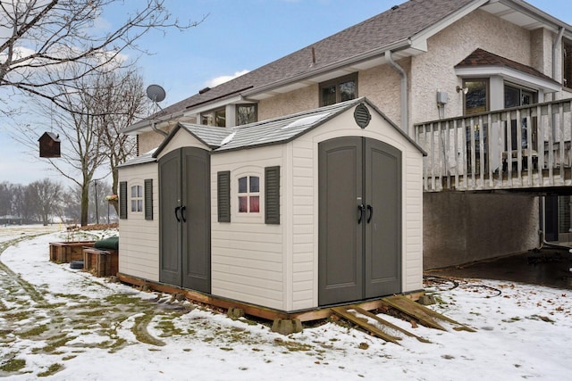 4985 142nd Ln NW, Ramsey, MN 55303 - snow covered structure with a storage shed