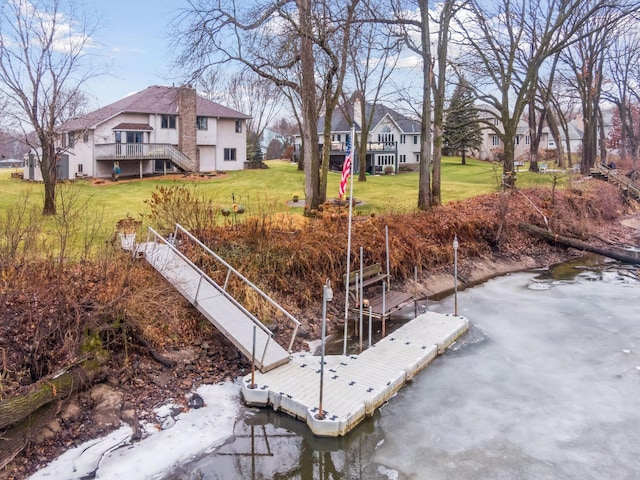 4985 142nd Ln NW, Ramsey, MN 55303 - view of green lawn with a floating dock, a residential view, and a water view