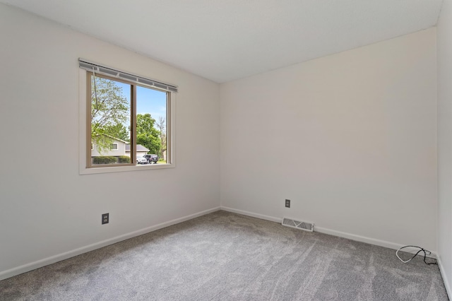 2908 81st Ave N, Brooklyn Park, MN 55444 - carpeted empty room with baseboards