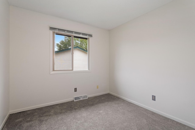 2908 81st Ave N, Brooklyn Park, MN 55444 - unfurnished room with carpet flooring and baseboards
