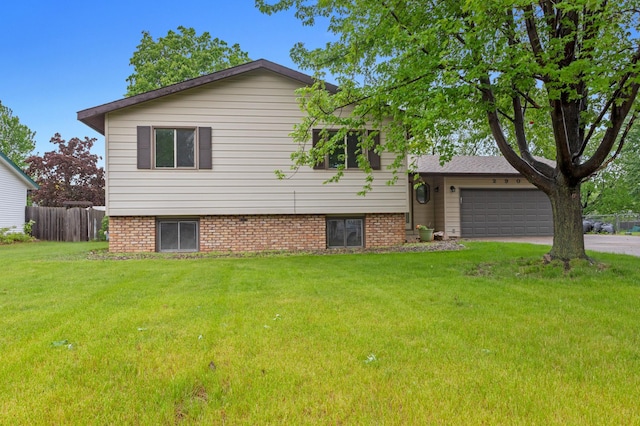 2908 81st Ave N, Brooklyn Park, MN 55444 - split level home with a garage and driveway