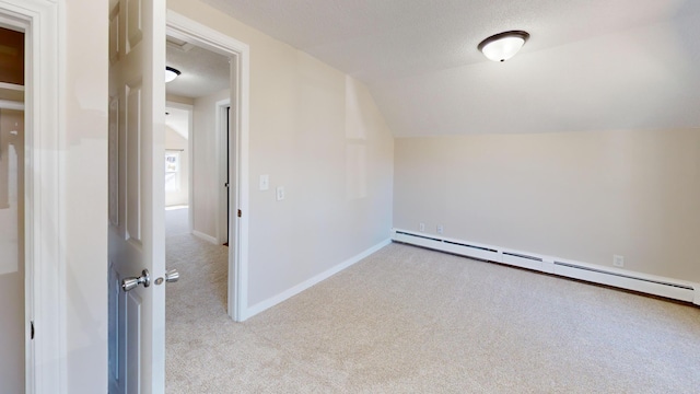 594 Charles Ave, Saint Paul, MN 55103 - bonus room with carpet floors, a baseboard radiator, lofted ceiling, and baseboards
