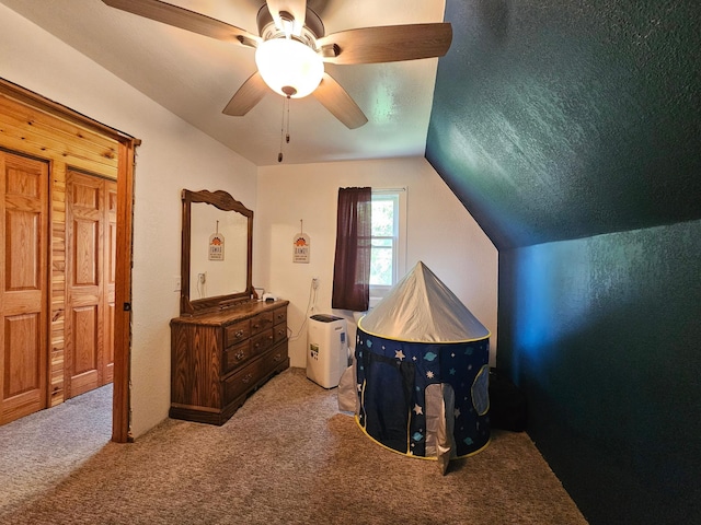 2032 70th Ave, Altona Twp, MN 56164 - carpeted bedroom featuring vaulted ceiling and ceiling fan