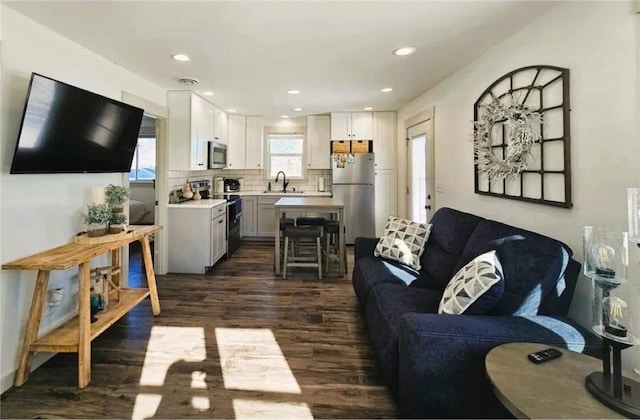 2011/2 10th Ave SE, Pipestone, MN 56164 - living area with dark wood finished floors and recessed lighting