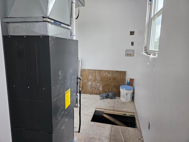 201 10th Ave SE, Pipestone, MN 56164 - utility room featuring heating unit